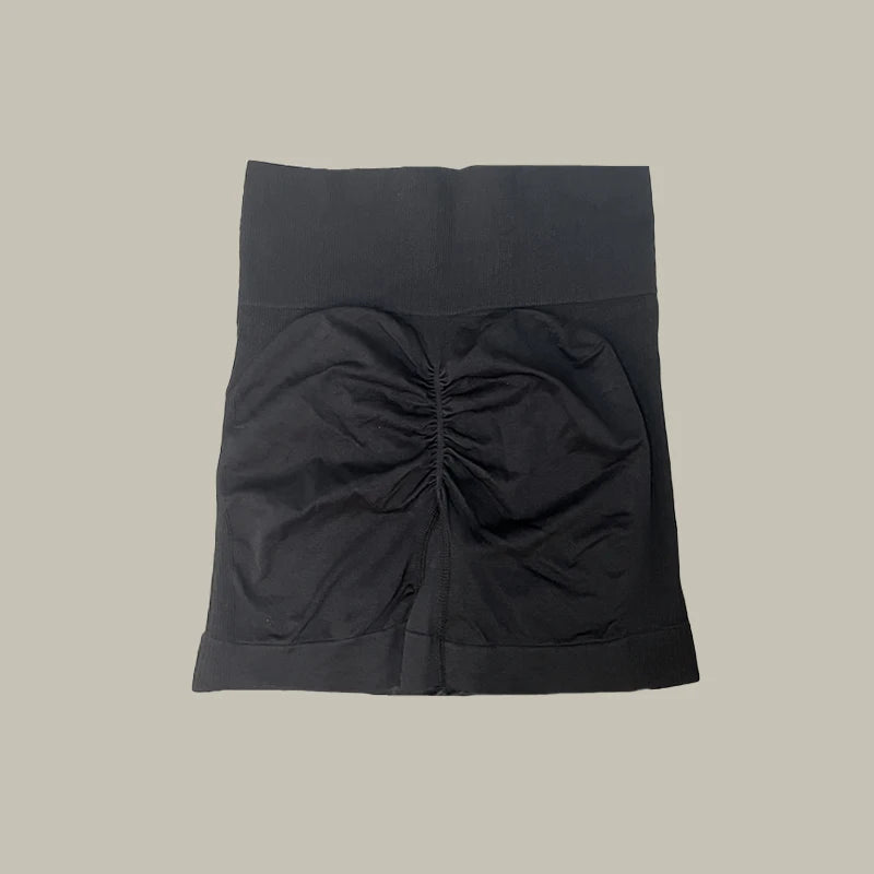 Black shorts of women’s high-waist workout shorts and matching sports bra two-piece set