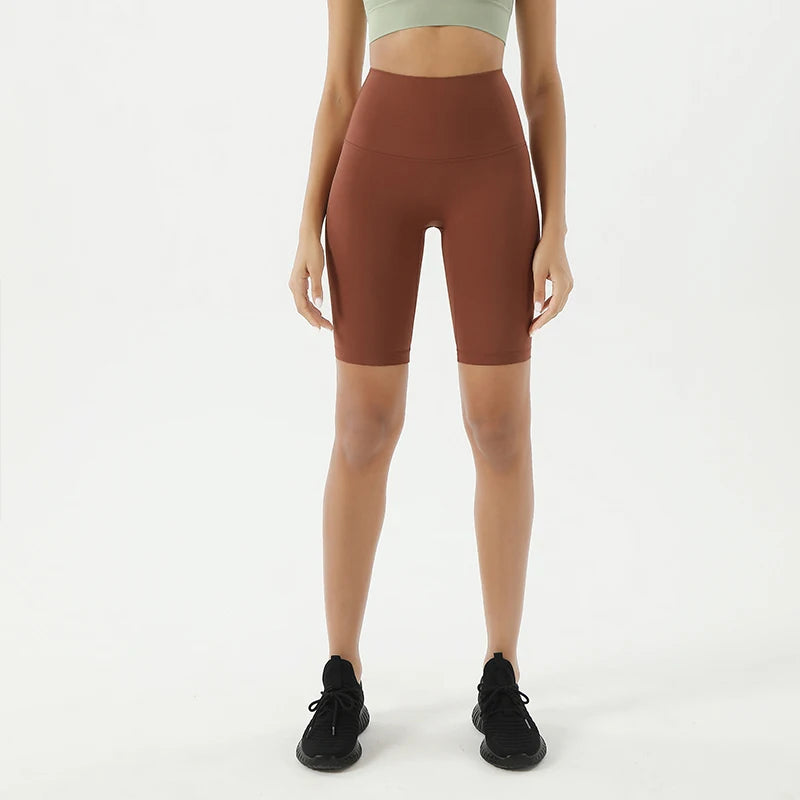 Woman modeling the front view of Bronze Breathable Cycling Shorts for Women