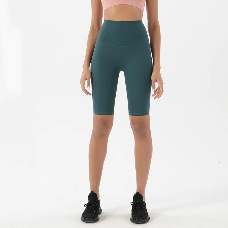 Woman modeling the front view of Emerald Breathable Cycling Shorts for Women