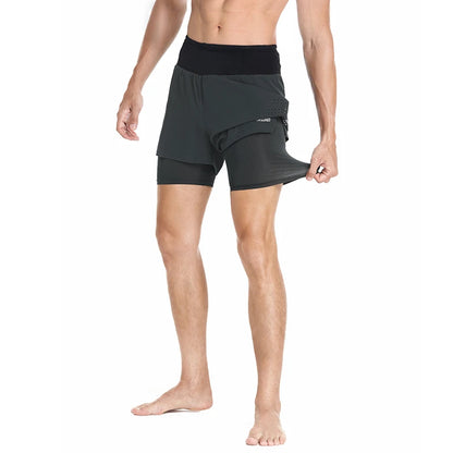 Man modeling the front view of Grey Double Layer High Waist 2 in 1 Running Shorts pulling on compression liner