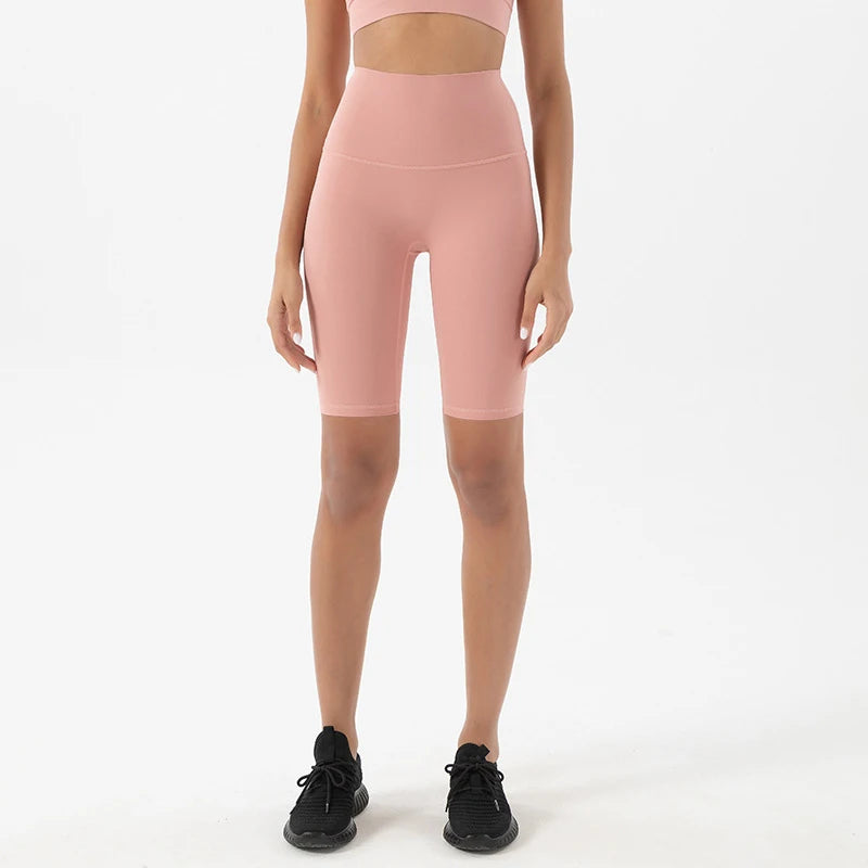 Woman modeling the front view of Pink Pastel Breathable Cycling Shorts for Women