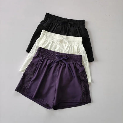 Purple, white, and black High Waist 2 in 1 Running Shorts layered for display. 