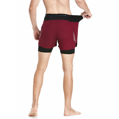 Man modeling the back view of Red Double Layer High Waist 2 in 1 Running Shorts pulling on waist line.