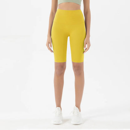 Woman modeling the front view of Sun Yellow Breathable Cycling Shorts for Women