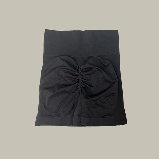Black shorts of women’s high-waist workout shorts and matching sports bra two-piece set
