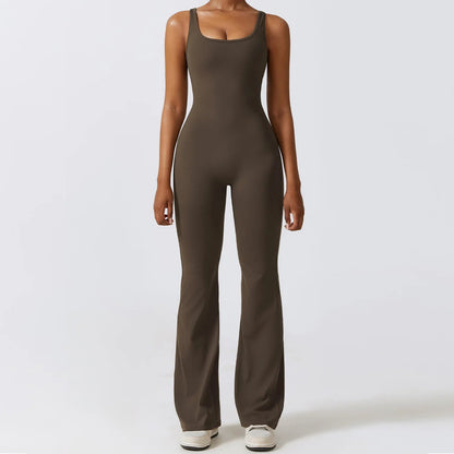 Front view of model wearing charcoal coffee women’s workout bodysuit, stretchy one-piece romper