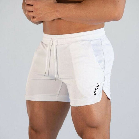 Man modeling the front view of white Leg Day Bodybuilding Shorts